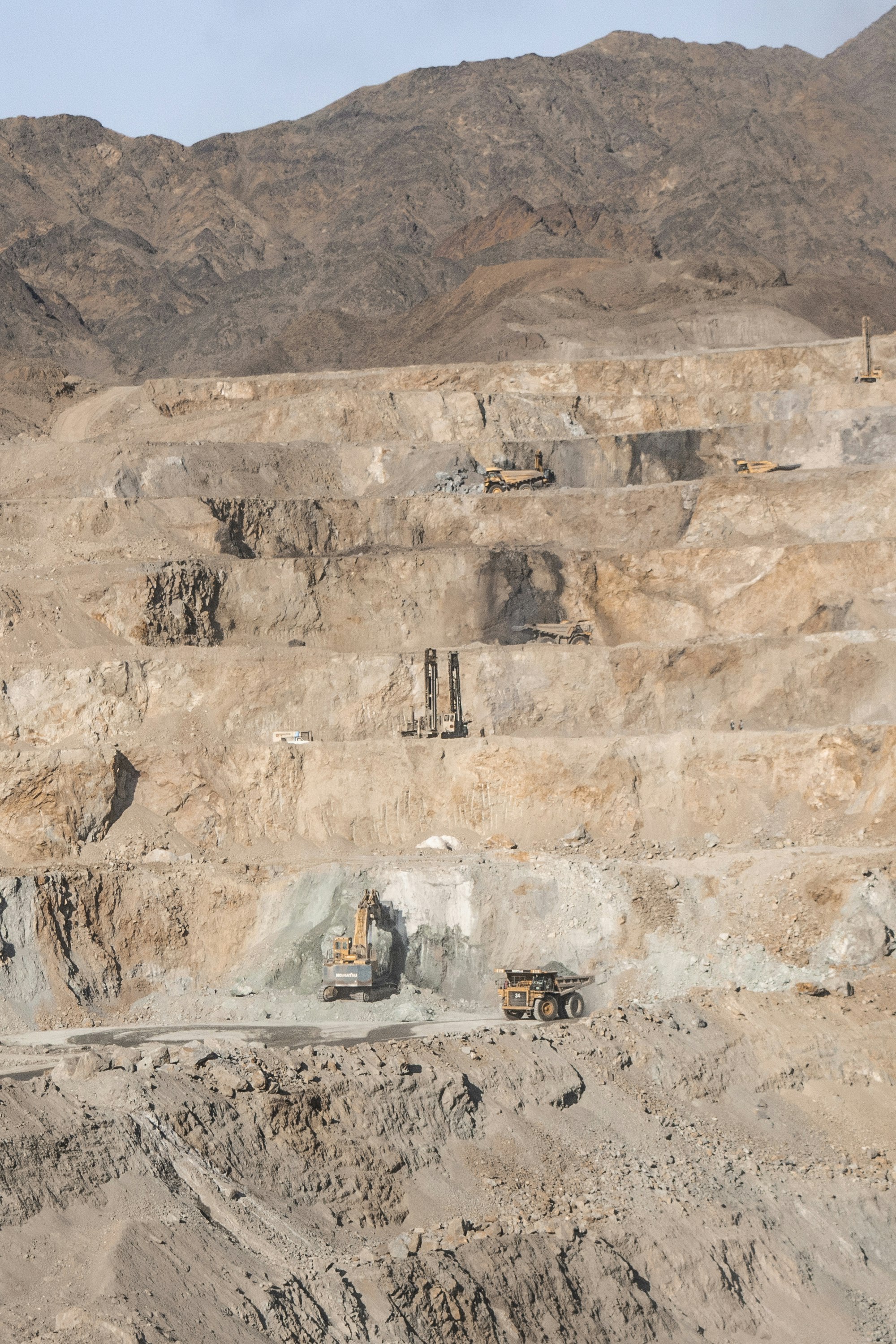 Terraced quarry benches ready for drilling and blasting