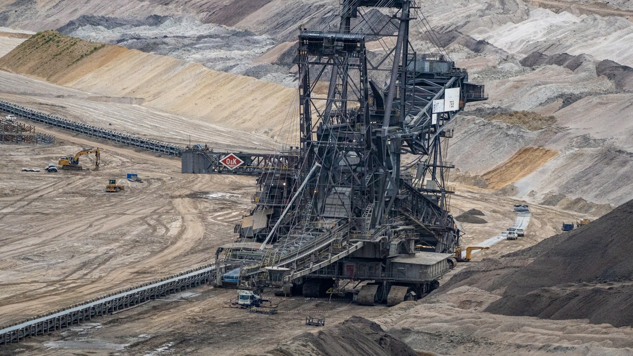 Heavy machinery working an open-pit operation